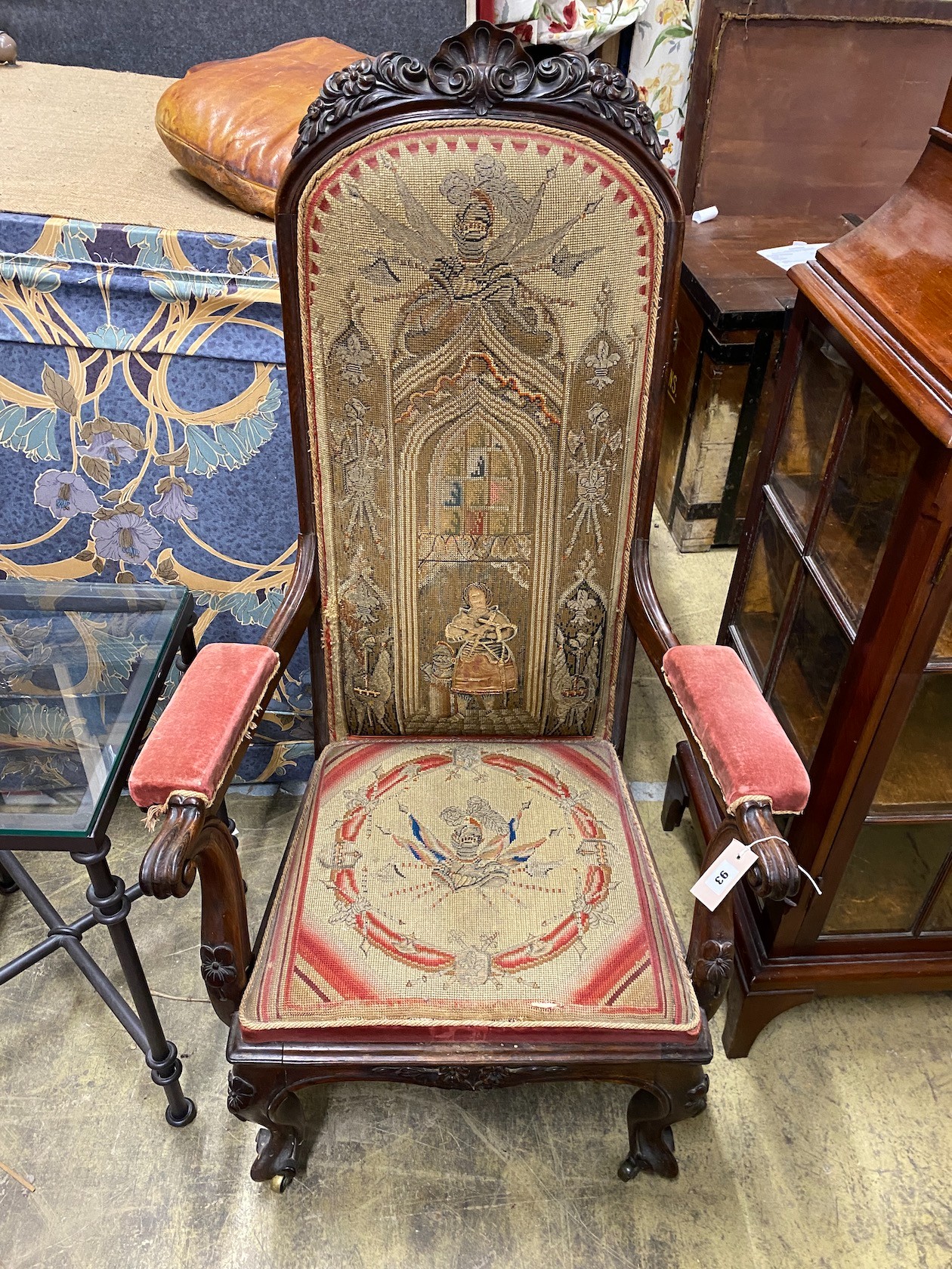 A Victorian carved rosewood elbow chair with tapestry seat and back, width 69cm, depth 47cm, height 122cm